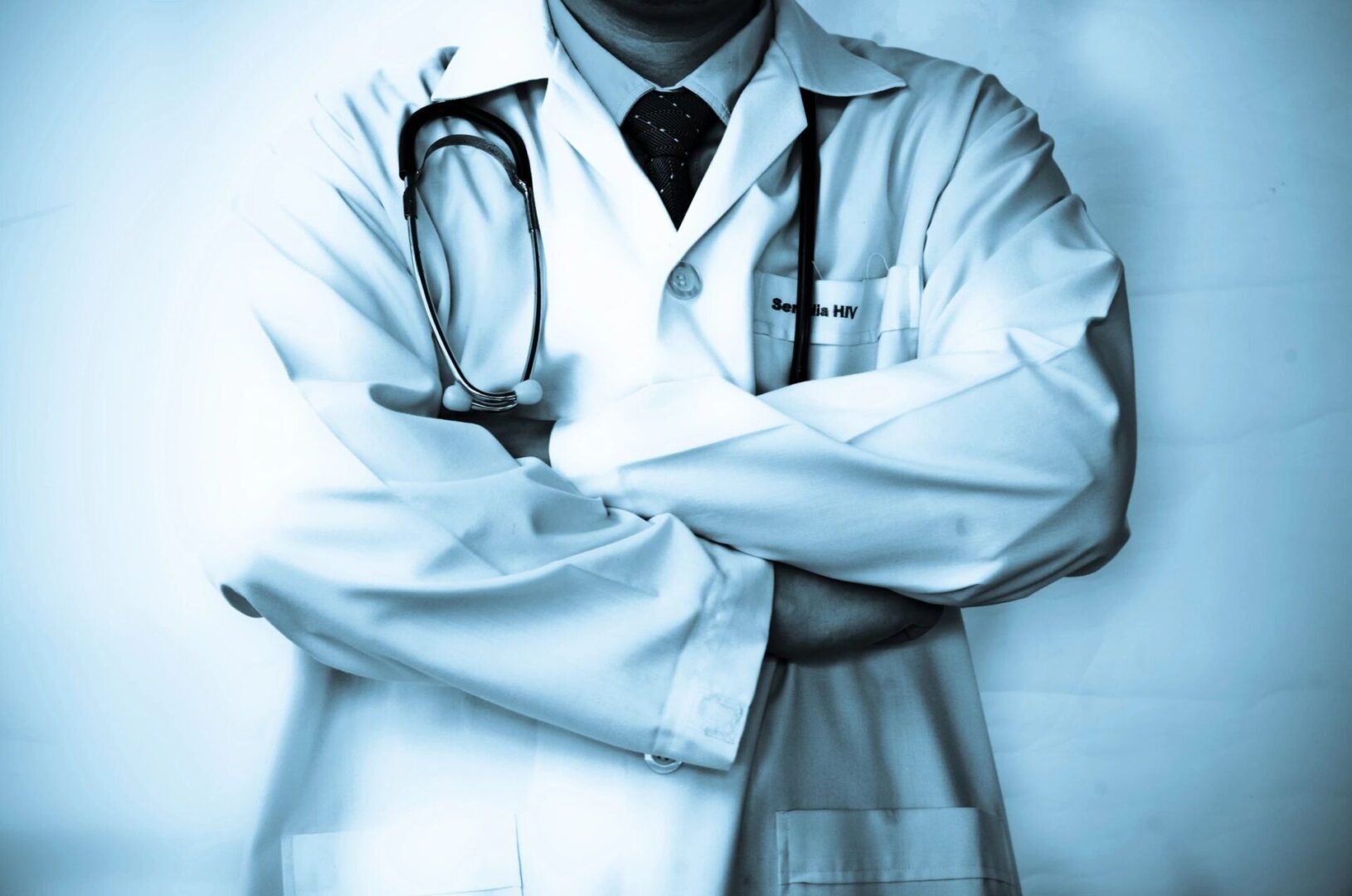 A doctor on white coat with stethoscope